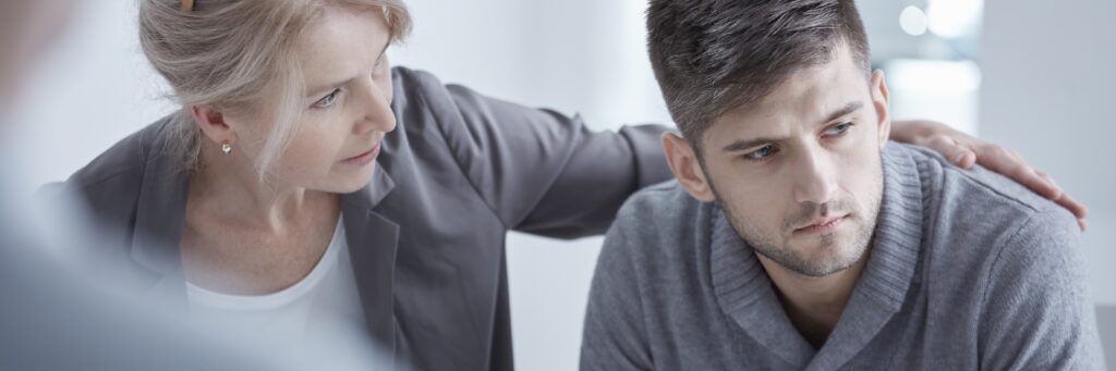 A man talks about his past trauma during a group session at trauma Therapy in kentucky.