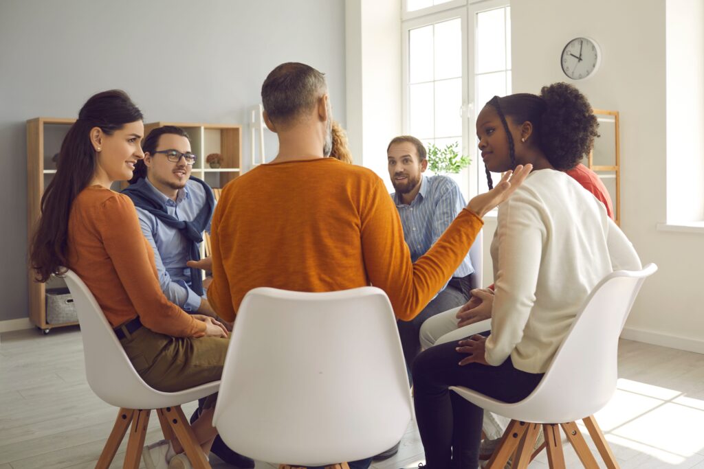 A group enjoys sharing during methamphetamine rehab in kentucky.