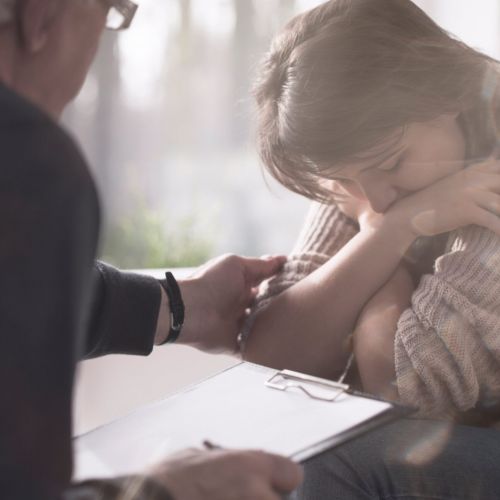 A woman is comforted during trauma Therapy in kentucky.