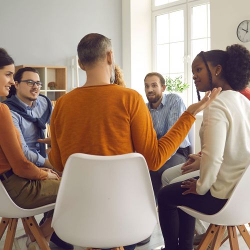 A group enjoys sharing during methamphetamine rehab in kentucky.